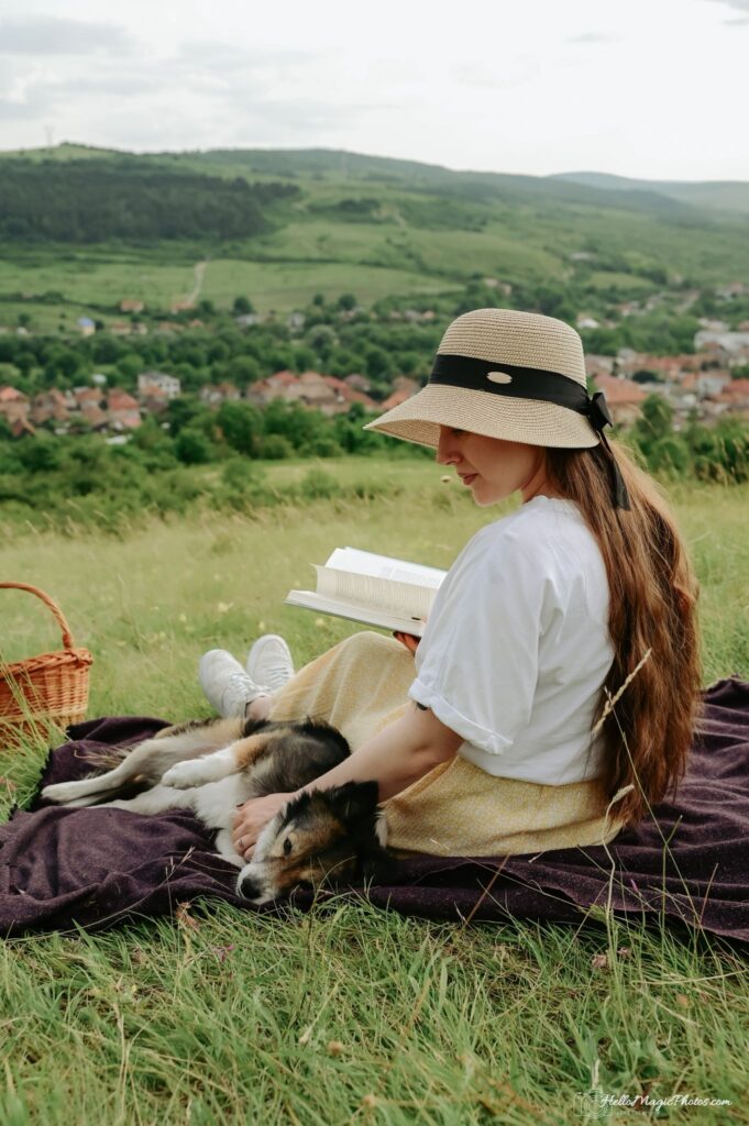 long hair romantic woman in summer sunset with a dog 